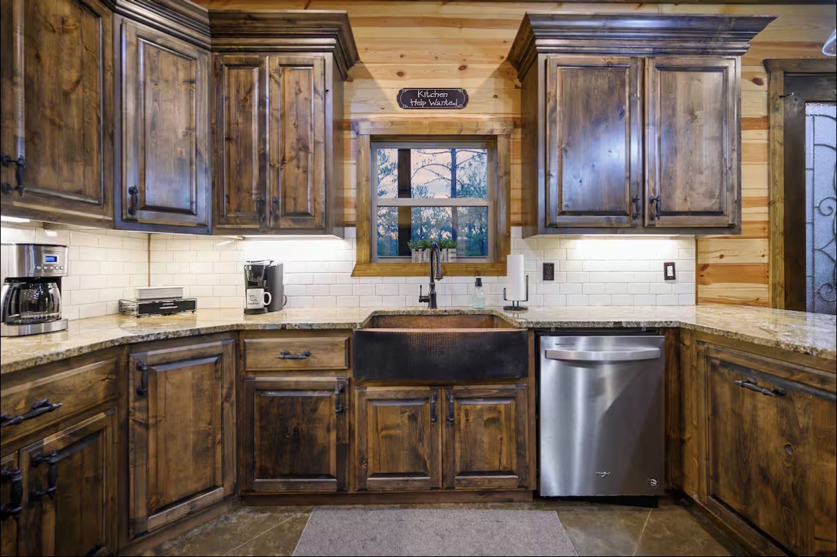 Sound of Sunshine — hammered copper farmhouse sink and subway-tile backsplash
