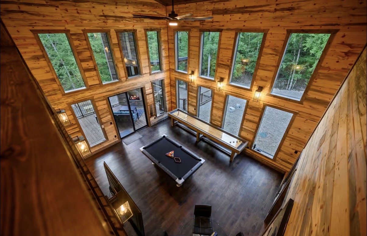 As Good As It Gets — two-story game room with pool table and shuffleboard