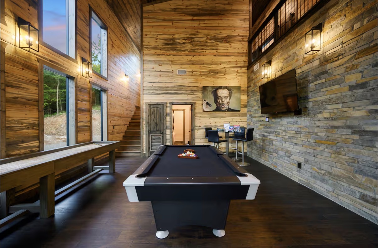 As Good As It Gets — game room with pool table, shuffleboard and TV