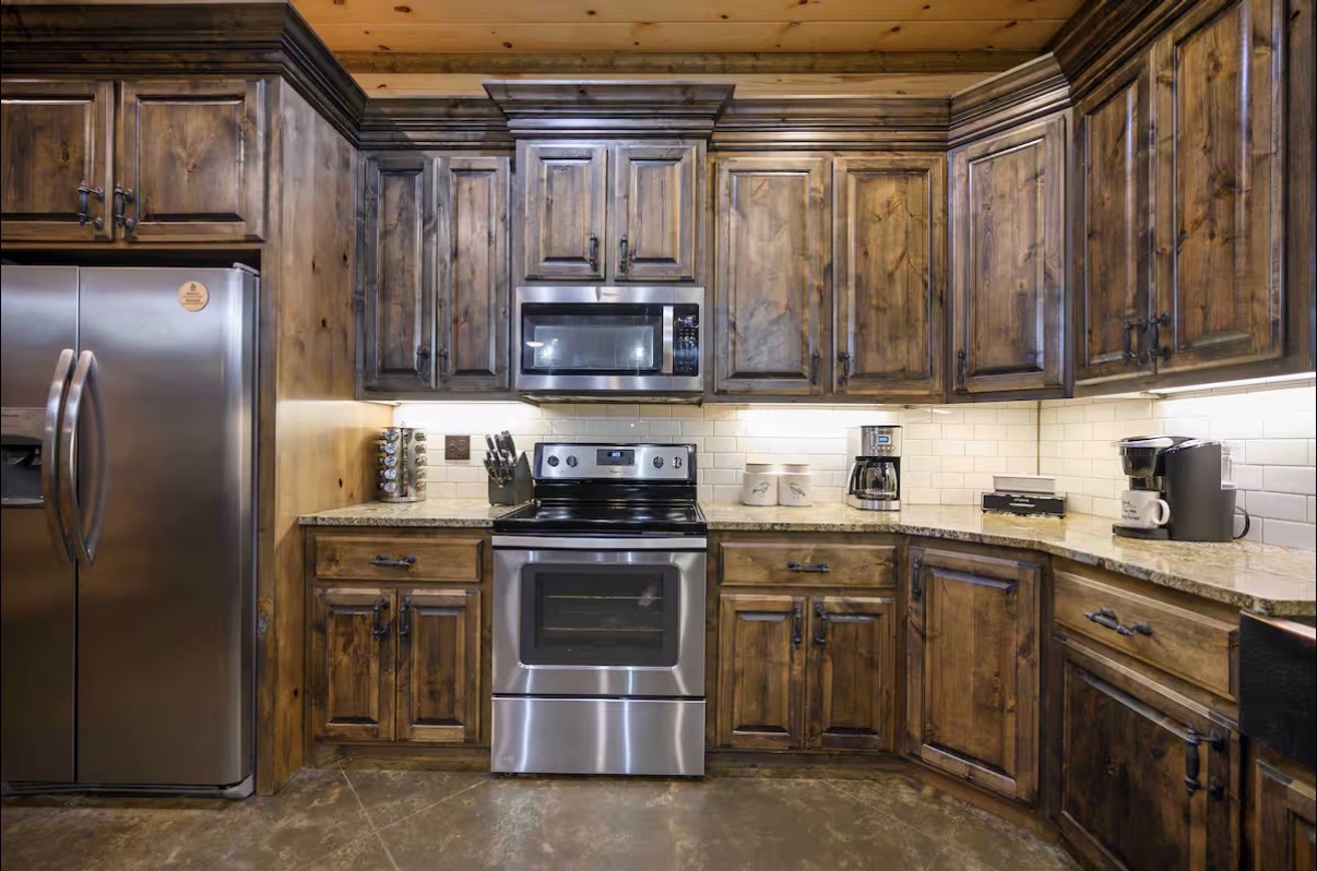 Sound of Sunshine — range and prep area with under-cabinet lighting