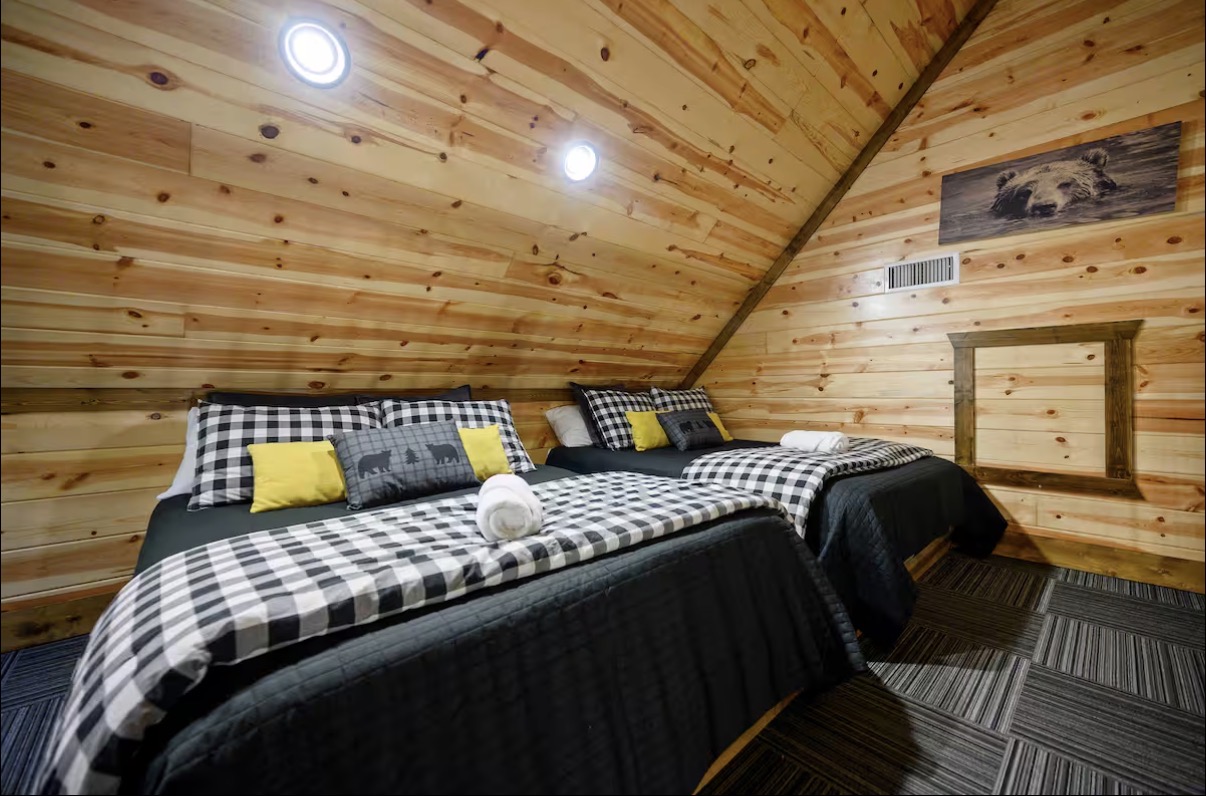 Sound of Sunshine — loft beds with buffalo-check bedding and bear print