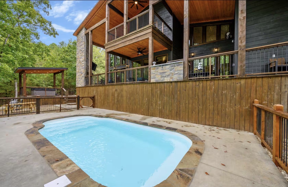 As Good As It Gets — pool with view of covered decks