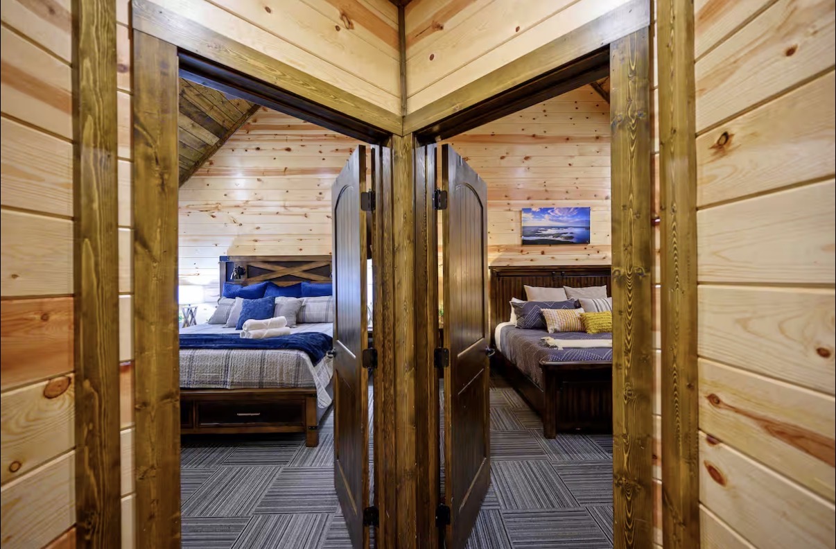 Sound of Sunshine — upstairs hallway between two king bedrooms with barn doors
