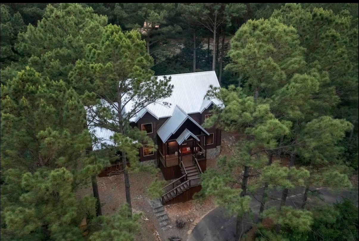 Sound of Sunshine — aerial front view of the cabin and driveway