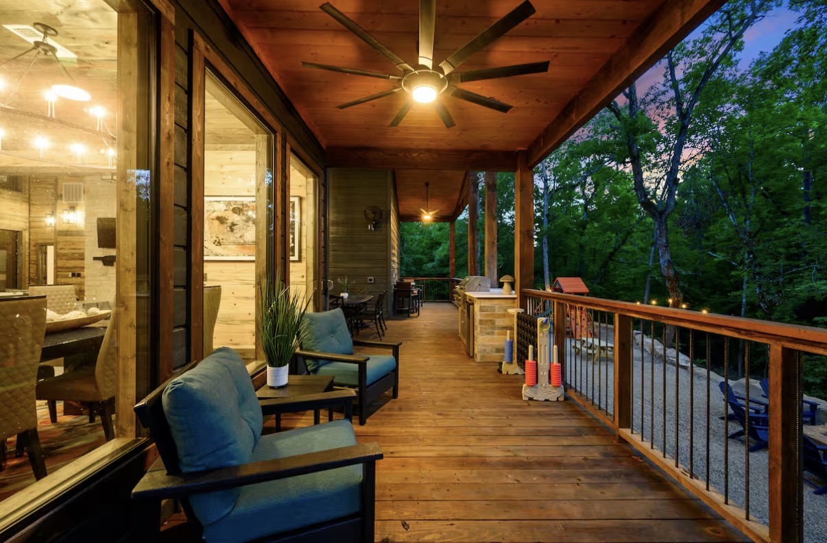 As Good As It Gets — wraparound deck with lounge seating and ceiling fans